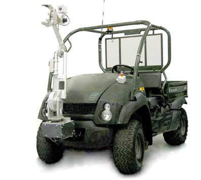 Kawasaki Mule retrofitted with the Pronto4 System and the RetroReach Manipulator Arm